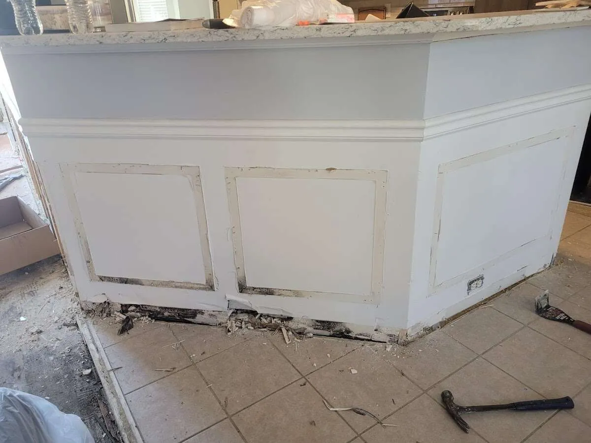 Water damage and mold on kitchen during Storm Damage Restoration in Weymouth Town
